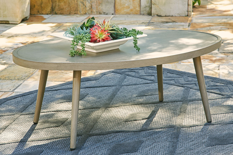 Swiss Valley - Beige - Oval Cocktail Table.