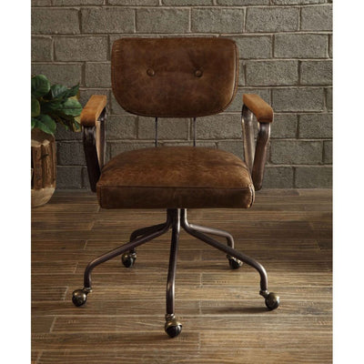 Our durable Hallie office chair gets its industrial look from oversized button tufted back and vintage top grain leather. The 5-star swivel base fitted with casters, it keeps you moving from one task to the next. Some Assembly Required.