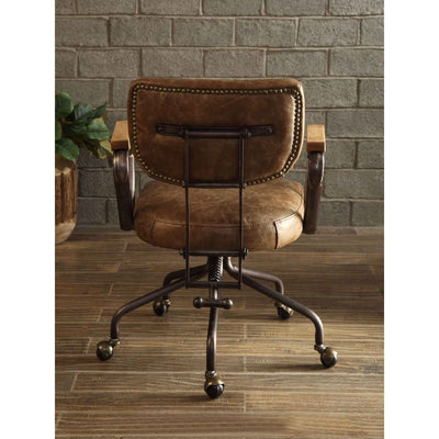 Our durable Hallie office chair gets its industrial look from oversized button tufted back and vintage top grain leather. The 5-star swivel base fitted with casters, it keeps you moving from one task to the next. Some Assembly Required.