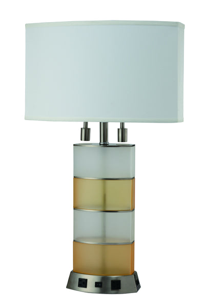 A Crown Mark 19.5" Height Table Lamp - Gold with a rectangular, off-white shade and a vertical, stacked base featuring alternating bands of frosted and amber glass, set on a dark, square platform.