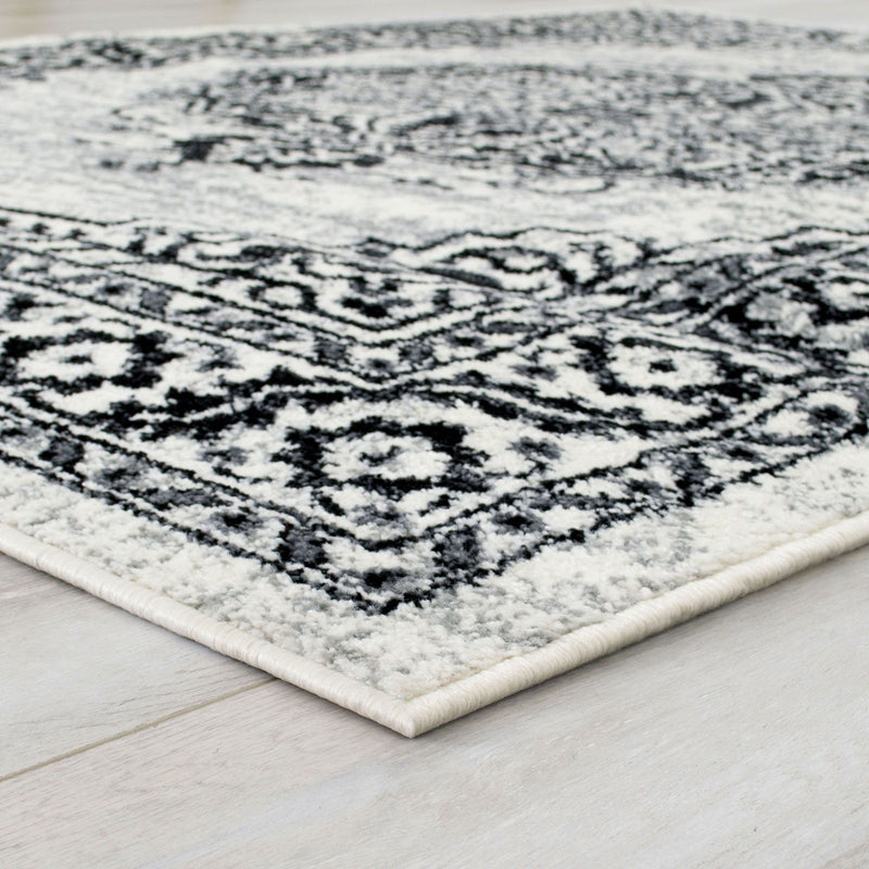 Serang - Area Rug - Gray / Black Fabric - Grand Furniture GA