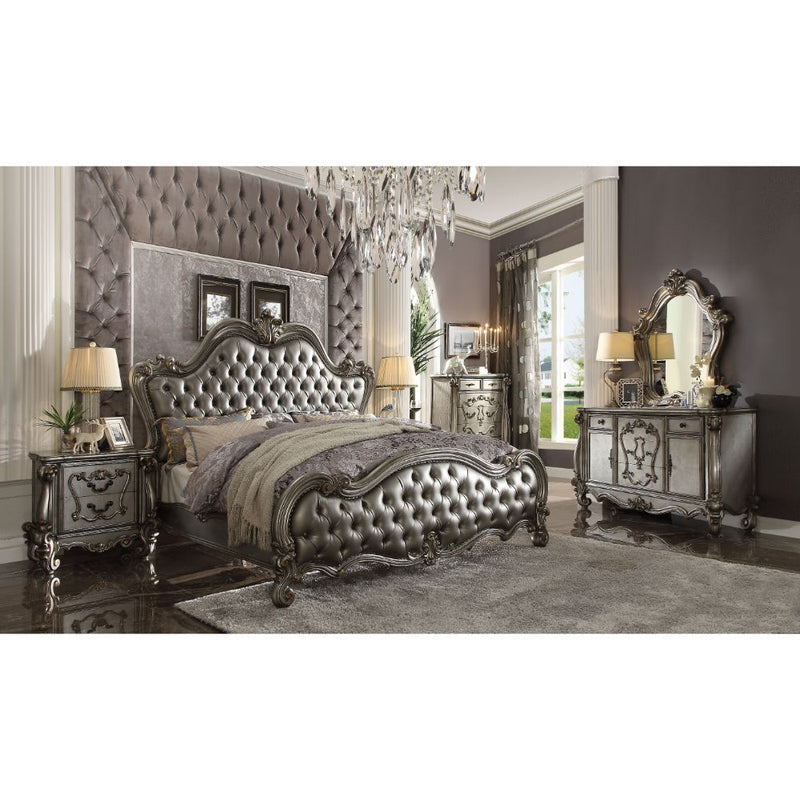 Turn your bedroom into a classy abode with this sophisticated Versailles II bed in a vintage PU. The curved wood trim on the headboard and footboard is accentuated with a fluted seashell motif crown.