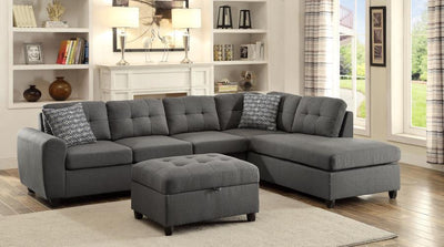 Stonenesse - Upholstered Tufted Sectional With Storage Ottoman - Grey.